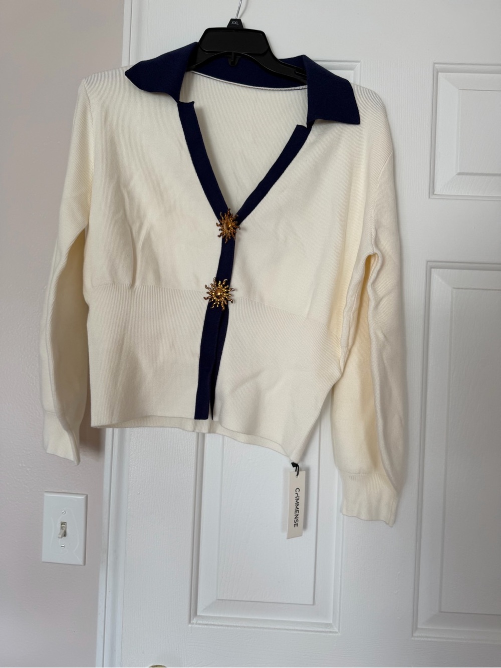Melissa Cream Cardigan with Navy Trim and Gold Starburst Buttons